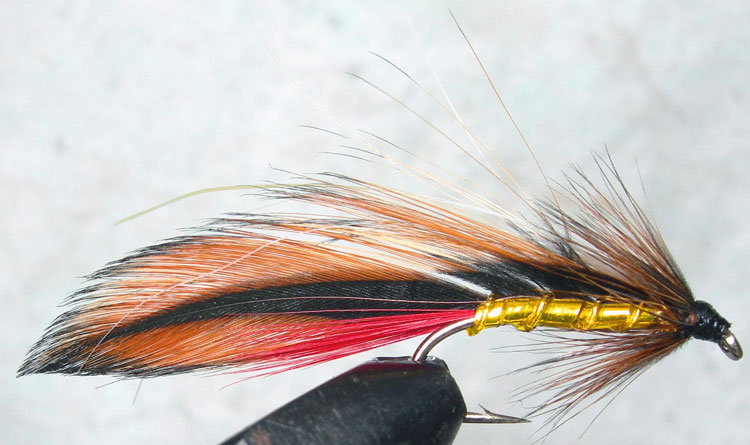 Ginger Mick Flashabou trout fly