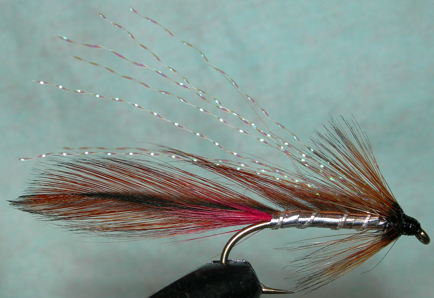 Ginger Mick silverbody KrystalFlash trout fly