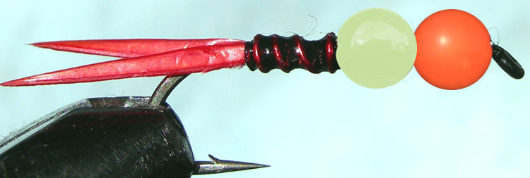 Tungsten Orange&Lumo red rib trout fly